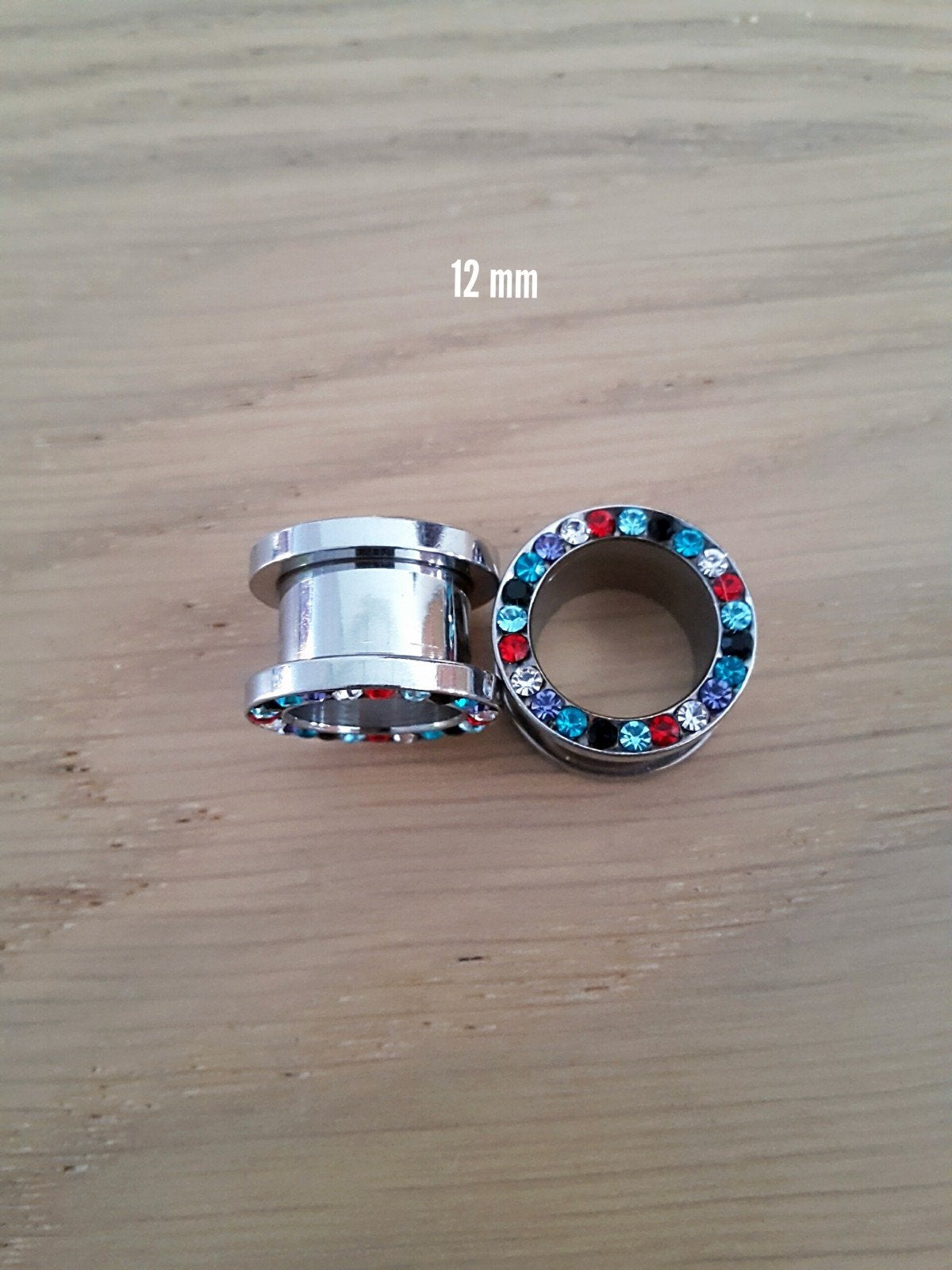 Nieuwe tunnels, pluggen. Staal. Gekleurde steentjes., Sieraden, Tassen en Uiterlijk, Piercings, Ophalen of Verzenden, Zo goed als nieuw