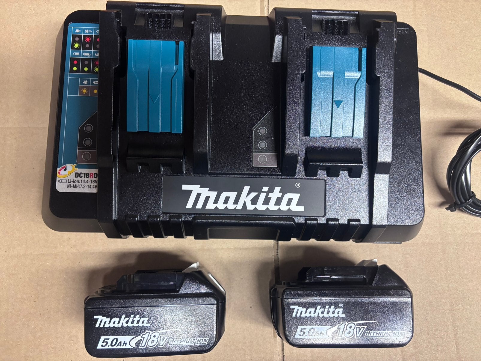 Makita duolader incl 2 accus 18v 5,0ah nieuw, Doe-het-zelf en Verbouw, Ophalen of Verzenden, Nieuw