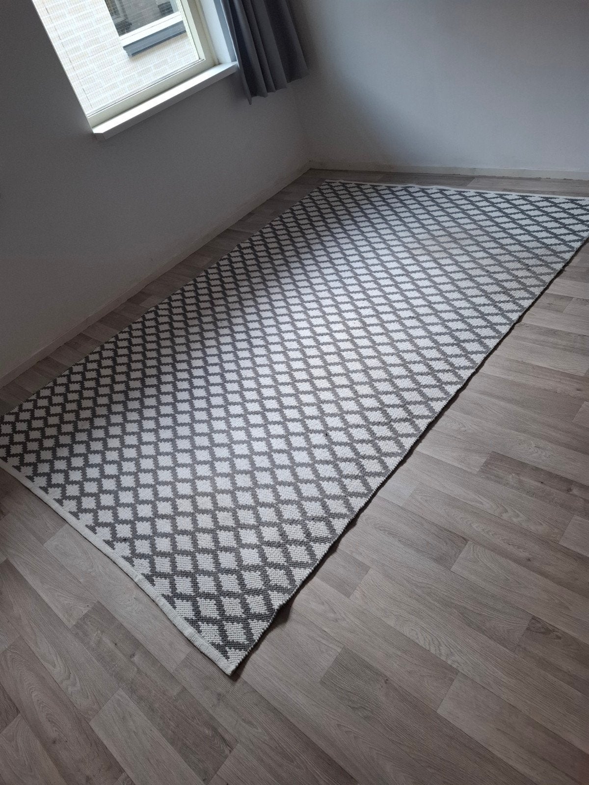 Vloerkleed, Ophalen, Zo goed als nieuw