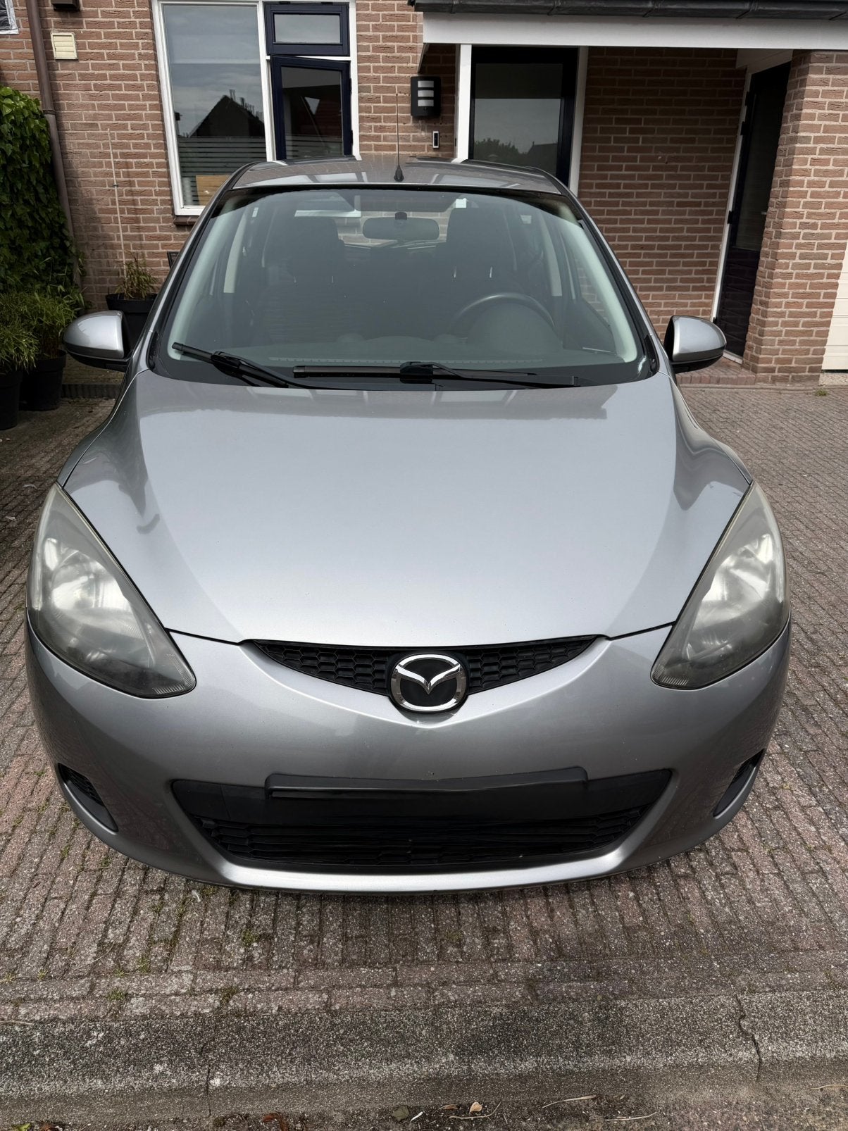 Mazda 2 1.3 55KW 5DRS 2009 Grijs, Voorwielaandrijving, 74 pk, 31 €/maand, 4 cilinders