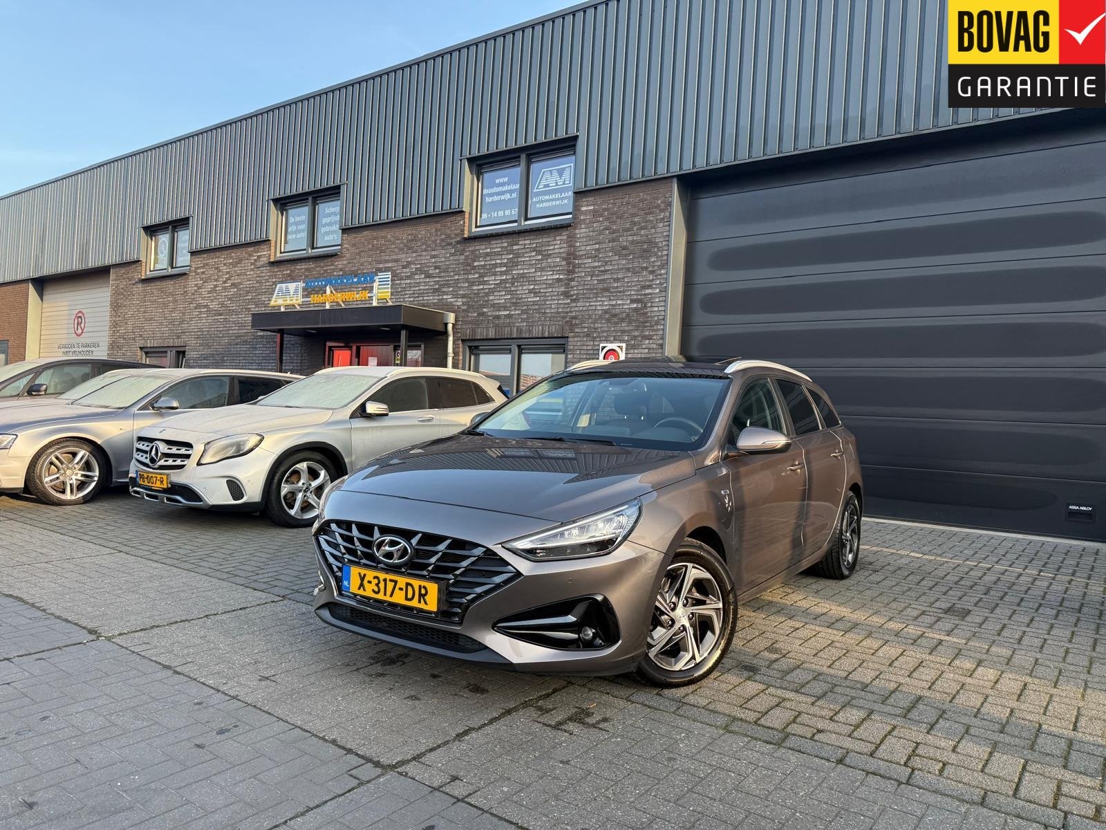 Hyundai i30 Wagon 1.5 T-GDi MHEV Premium | 1E EIGENAAR | 3/6, Auto's, Gebruikt, Euro 6, 4 cilinders, Bruin