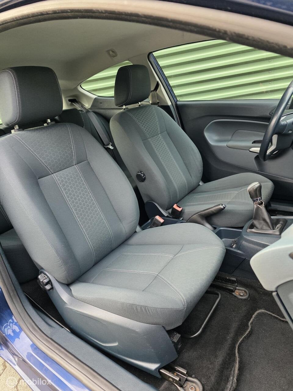 Foto 13 van Ford Fiesta 1.25 Titanium|Airco|2x Sleutel|PDC|