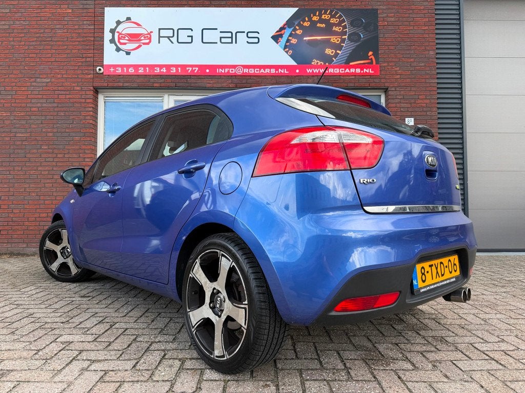 Kia Rio 1.2 CVVT BusinessLine / Airco / 5DRS / Cruise / AUX, Auto's, Kia, 4 cilinders, Met garantie (alle), Blauw, Origineel Nederlands