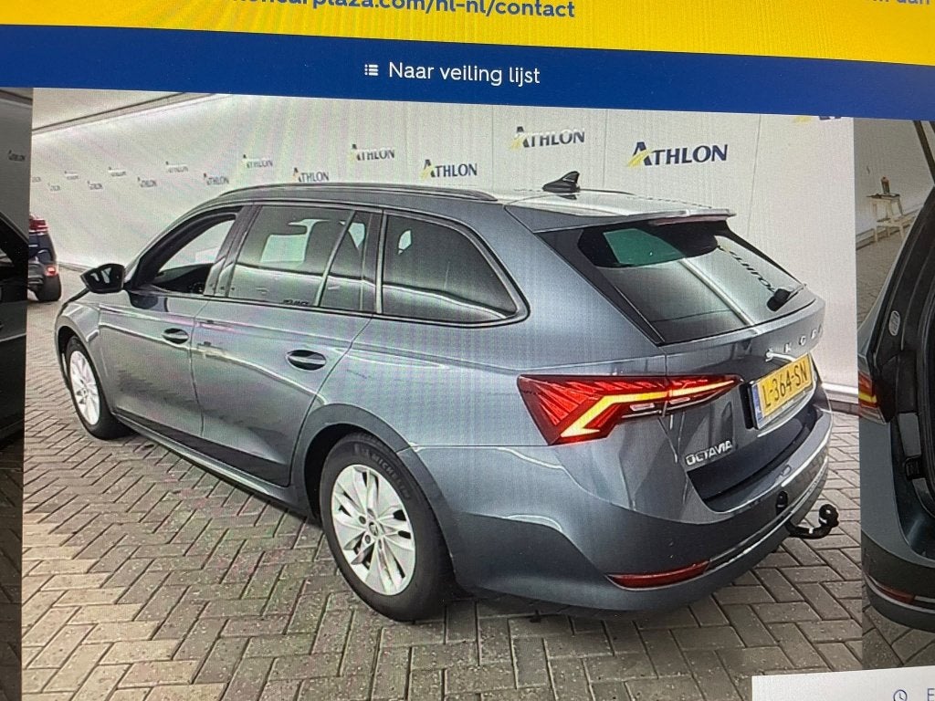 Skoda Octavia Combi 1.0 e-TSI Sport Bns Automaat TREKHAAK /, Auto's, Automaat, Stof, Gebruikt, 23 km/l