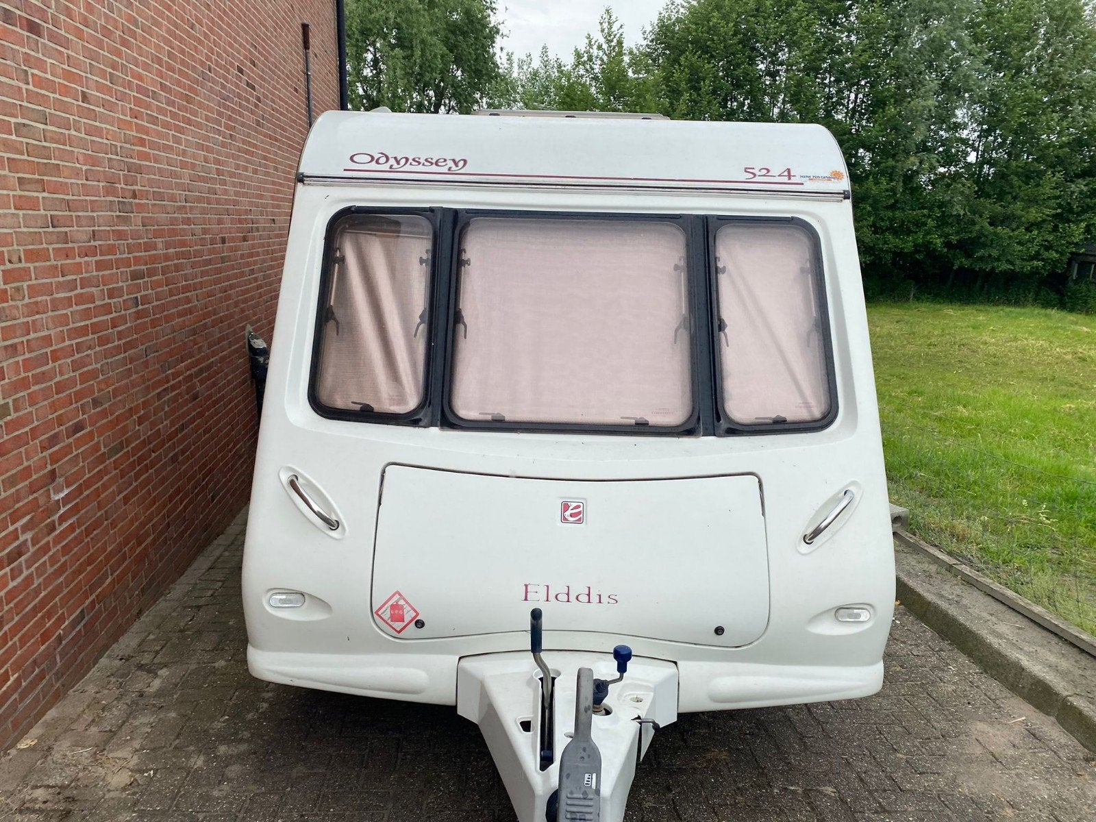 Elddis Odyssey 524 (2009) - Topsegment Caravan enkele bedden, Caravans en Kamperen, Caravans, 2 aparte bedden, Elddis, Treinzit