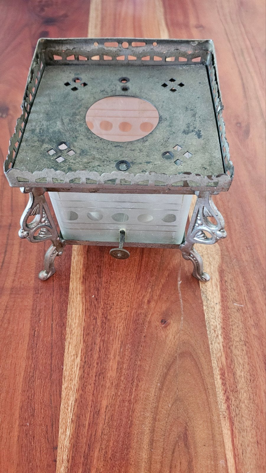 Antieke metalen theelichthouder/rechaud, Ophalen