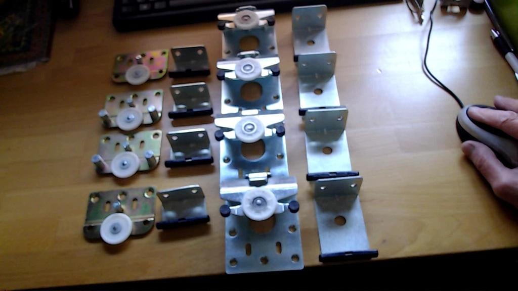2 sets Schuifdeur rollers, Doe-het-zelf en Verbouw, Hang- en Sluitwerk, Ophalen of Verzenden, Zo goed als nieuw, IJzer, Overige typen