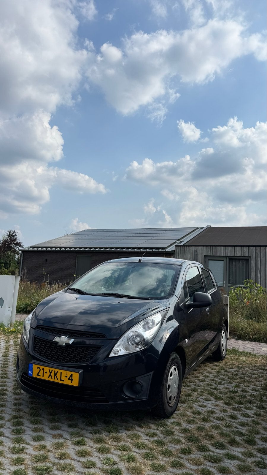 Chevrolet Spark 1.0 Bifuel 2012 Zwart LPG, Auto's, Voorwielaandrijving, 15 km/l, 37 €/maand, 4 cilinders