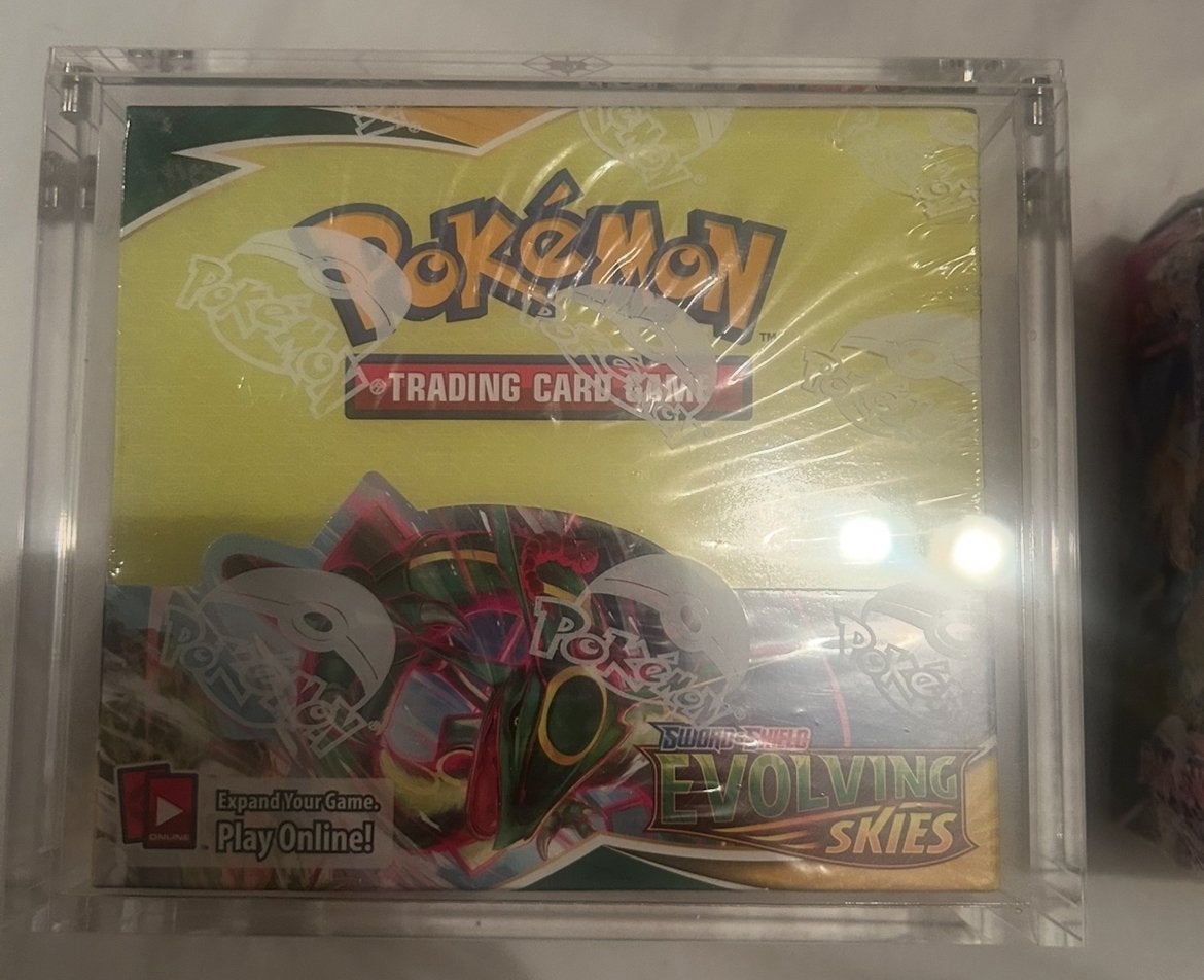 2x ETB en Boosterbox Evolving Skies, Hobby en Vrije tijd, Ophalen of Verzenden, Nieuw, Foil