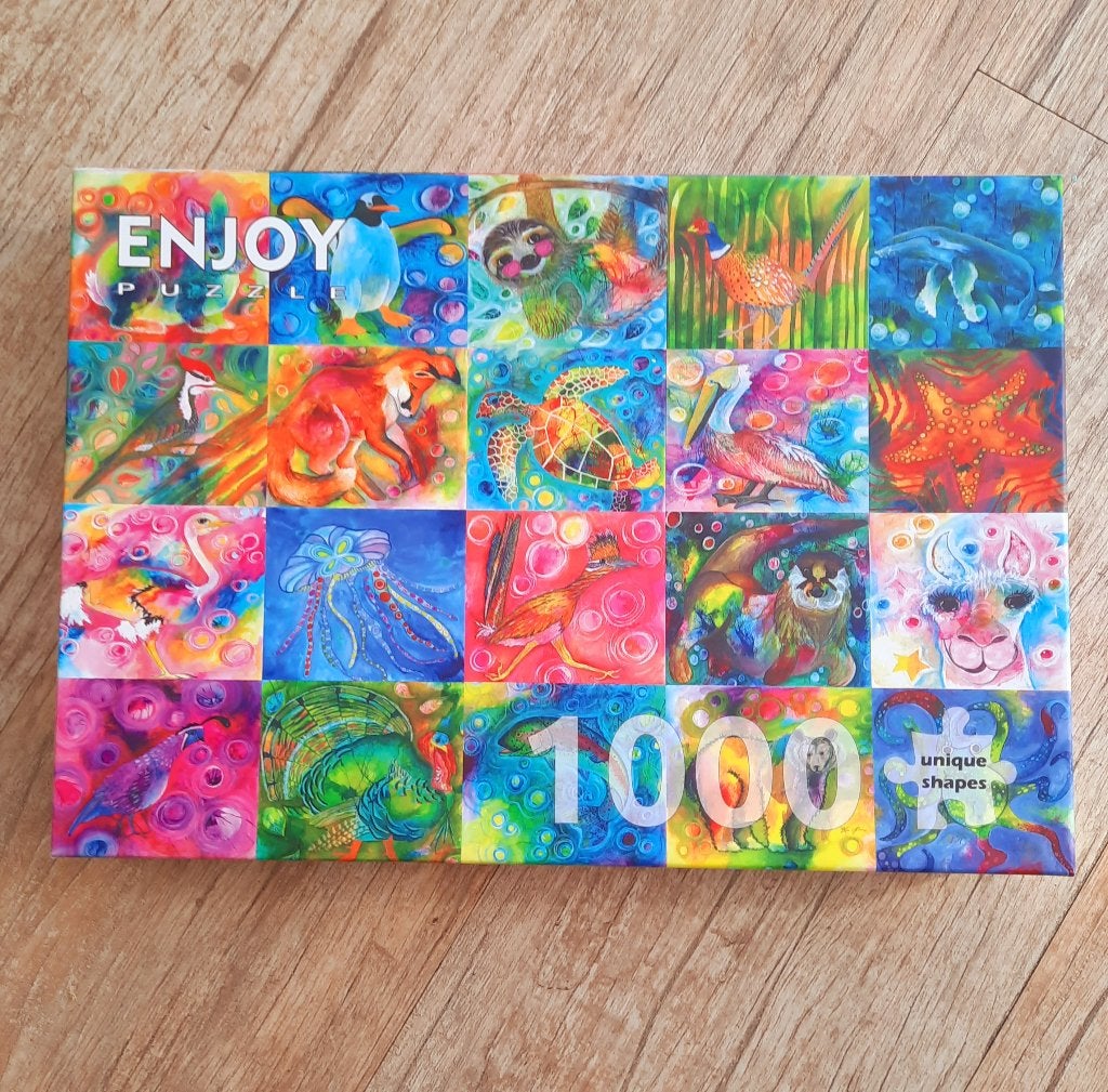 Kleurrijke puzzel Animal Magic   1000 stukjes, Ophalen of Verzenden, 500 t/m 1500 stukjes, Zo goed als nieuw, Legpuzzel