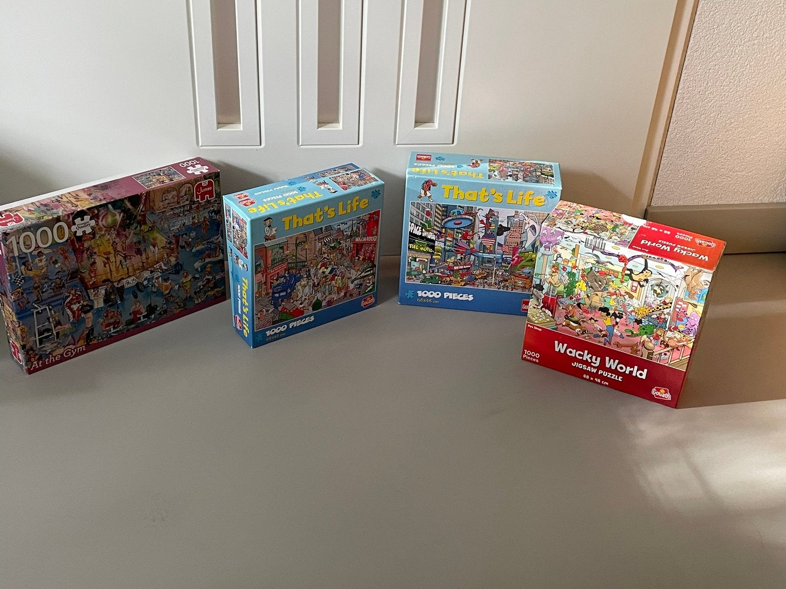 4 comic puzzels, Hobby en Vrije tijd, Ophalen of Verzenden, 500 t/m 1500 stukjes, Gebruikt, Legpuzzel