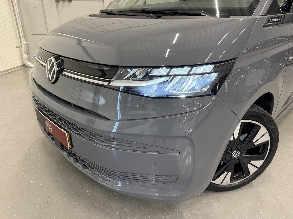 Volkswagen Multivan 1.4 eHybrid L2 BULLI EDITION 7p. PURE-GR, Auto's, Volkswagen, Stof, Gebruikt, Zwart, Met garantie (alle)