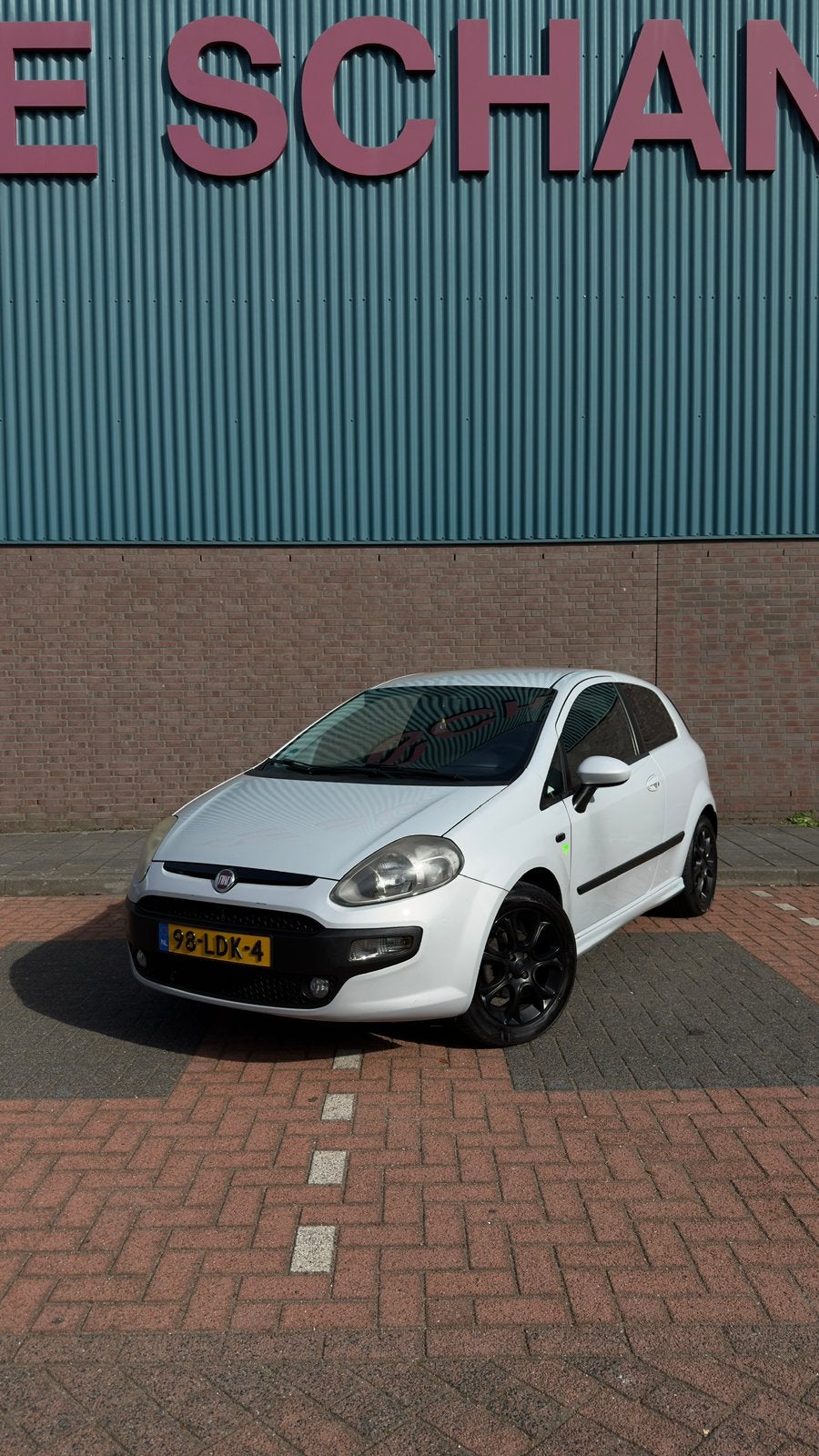 Fiat Punto 1.4 racing 3DR 2010 Parlemoer-Wit, Voorwielaandrijving, 40 €/maand, Zwart, 4 cilinders