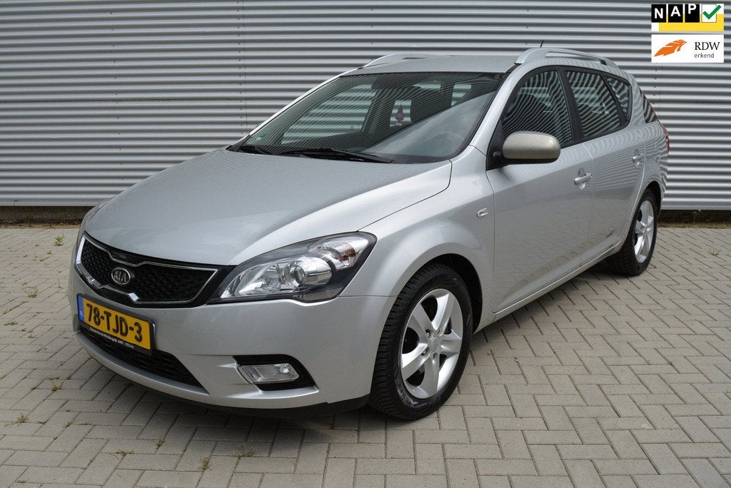 Kia Cee'd Sporty Wagon 1.4 CVVT Navigator Plus Pack | Navi |, Auto's, Kia, Voorwielaandrijving, Euro 5, Stof, 4 cilinders