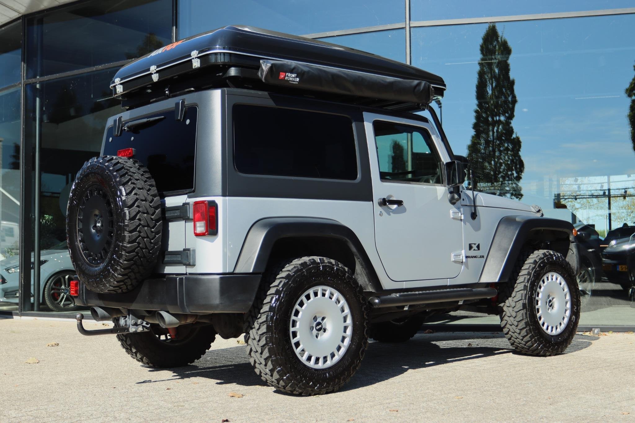 JEEP WRANGLER 3.8 V6 HIGH SPORT 4X4 AUT. *UNIEK* | CARPLAY |, Auto's, 3778 cc, Stof, Gebruikt, Parkeercamera