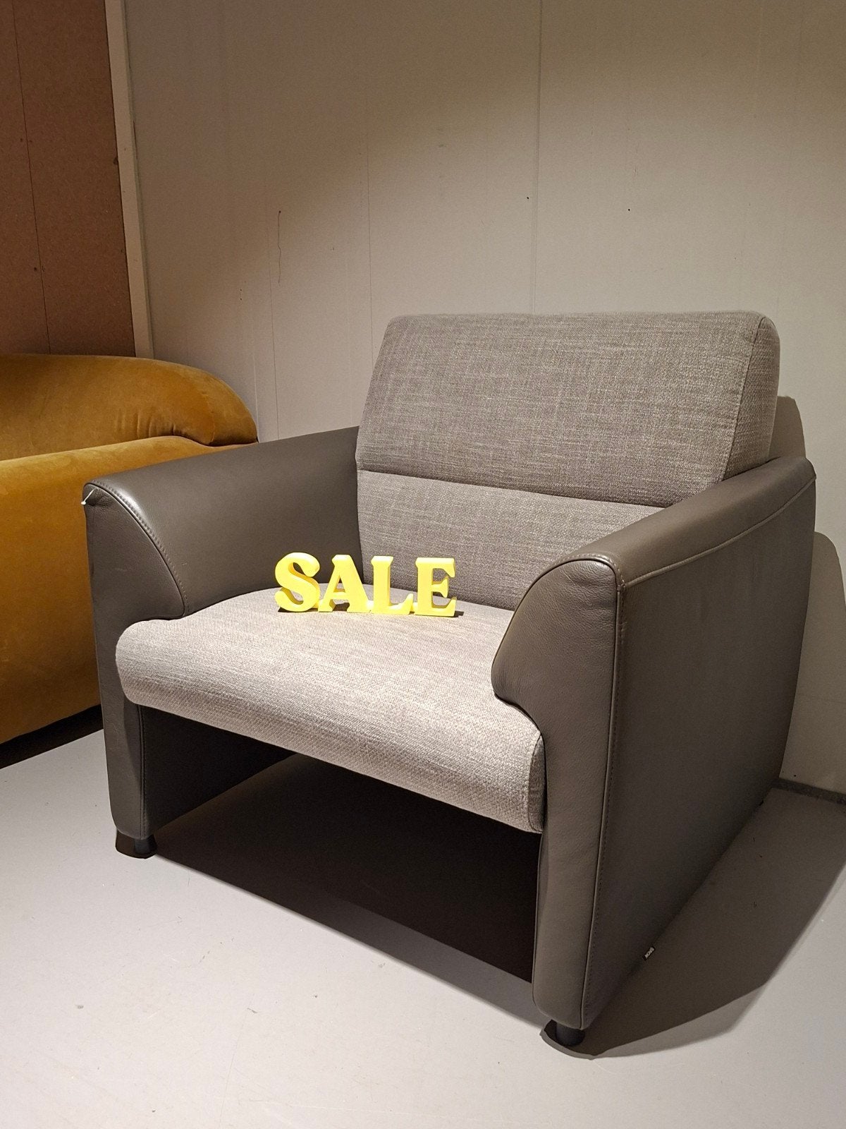 Showroommodel Montel Fauteuil Mondi stof/leer, Ophalen, 75 tot 100 cm, Zo goed als nieuw, Leer