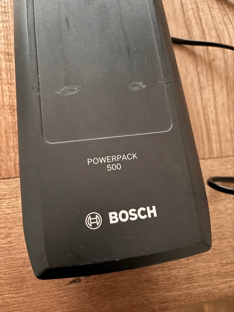 Accu en oplader BOSCH (powerpack 500) voor ebike Cortina U4, Zo goed als nieuw