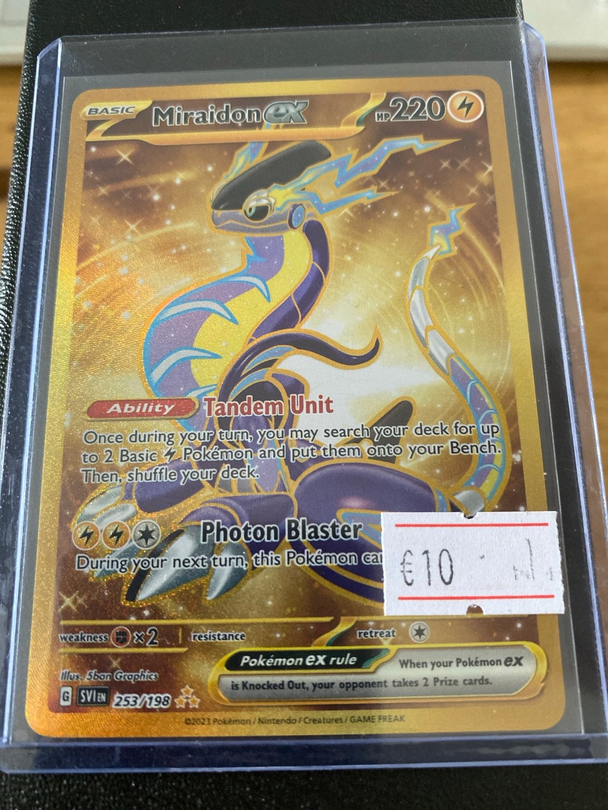 Pokémon Miraidon ex 253/198 Gold Secret Rare, Ophalen of Verzenden, Zo goed als nieuw, Losse kaart, Foil