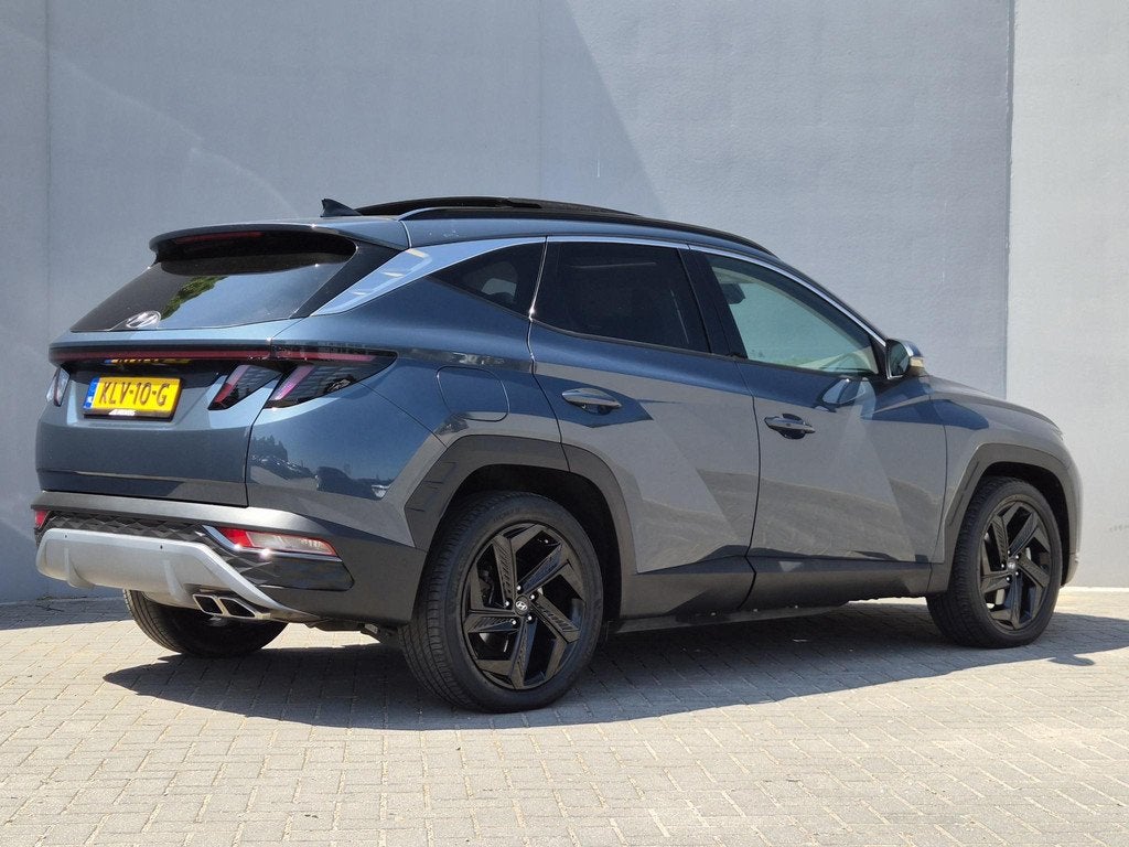 Hyundai Tucson 1.6 T-GDI PHEV Premium Sky 4WD / Glazen schui, Auto's, Hyundai, Automaat, 1350 kg, 14 kWh, Gebruikt