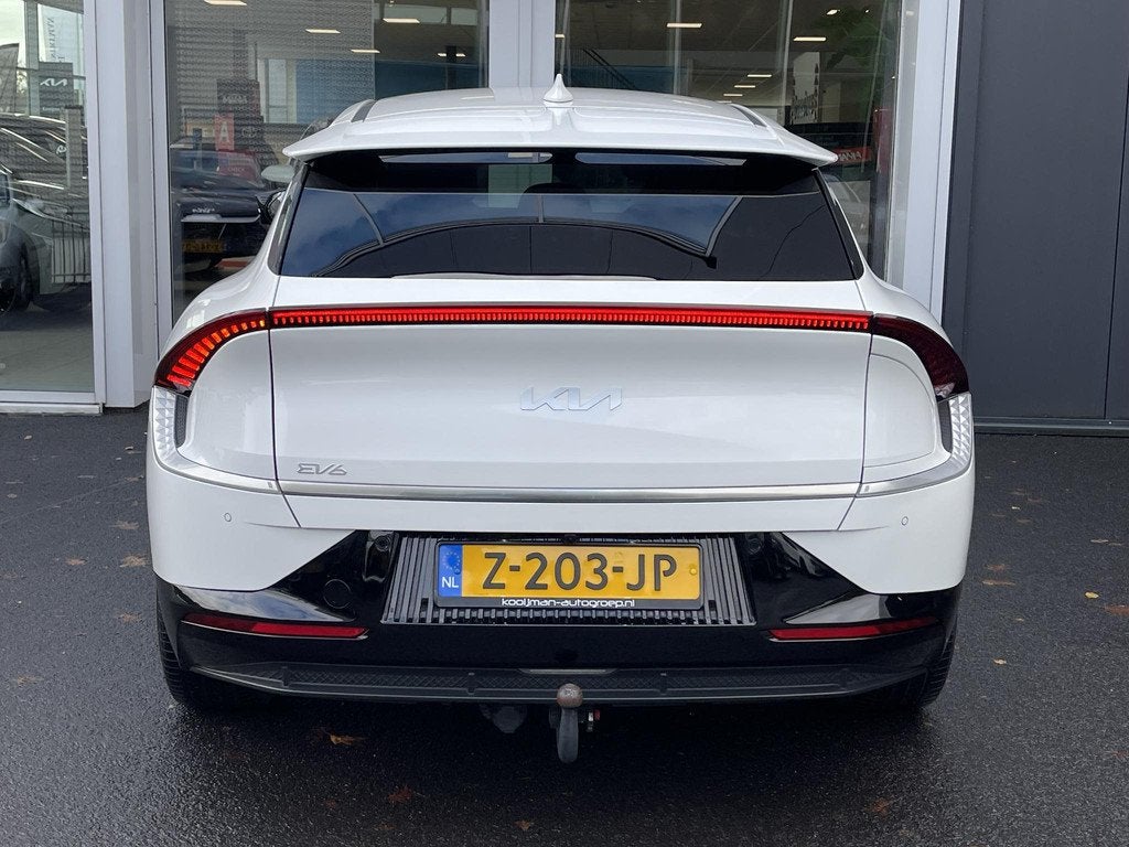 Kia EV6 Plus 77.4 kWh | SOH 100% | Trekhaak 13-polig, stoel, Auto's, Kia, 228 pk, Achterwielaandrijving, Gebruikt, Wit