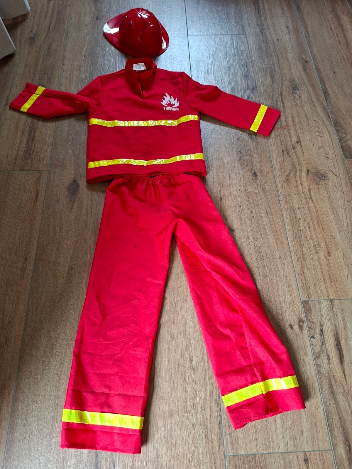 Brandweerman verkleedpak met helm, Ophalen of Verzenden, Gebruikt, 122 t/m 128, Jongen of Meisje
