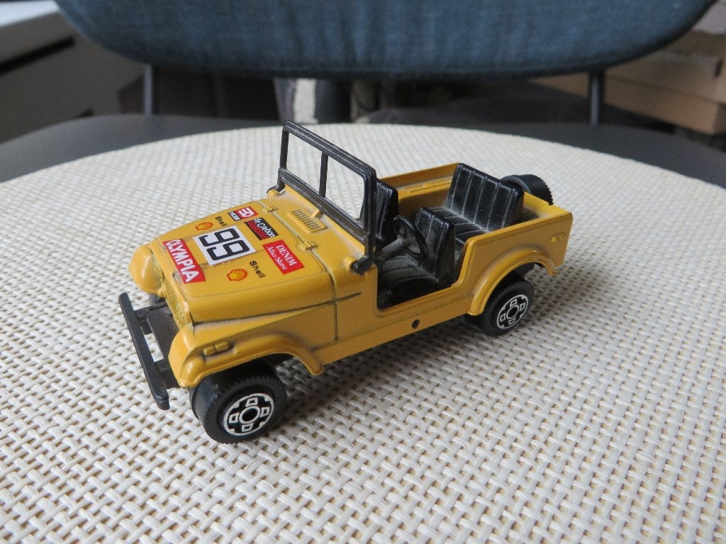 Burago JEEP CJ 7 geel, Ophalen of Verzenden, Gebruikt, Auto, Overige merken