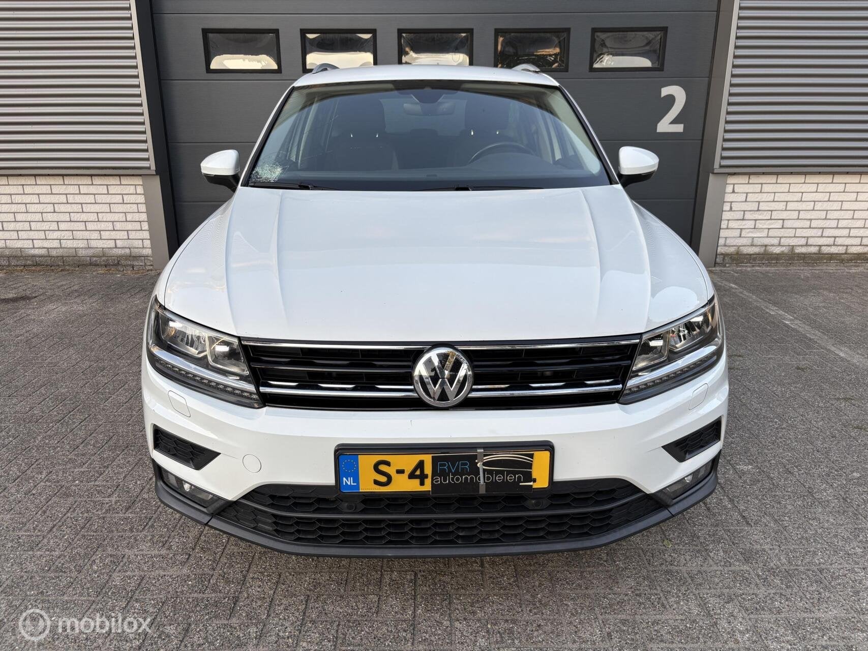 Volkswagen Tiguan 2.0 TSI 4Motion Highline, Automaat, Stof, Gebruikt, Zwart