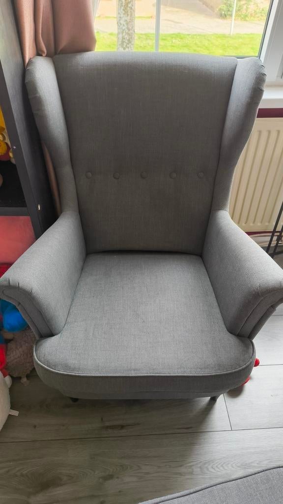 Strandmon fauteuil met voetenbank, Ophalen