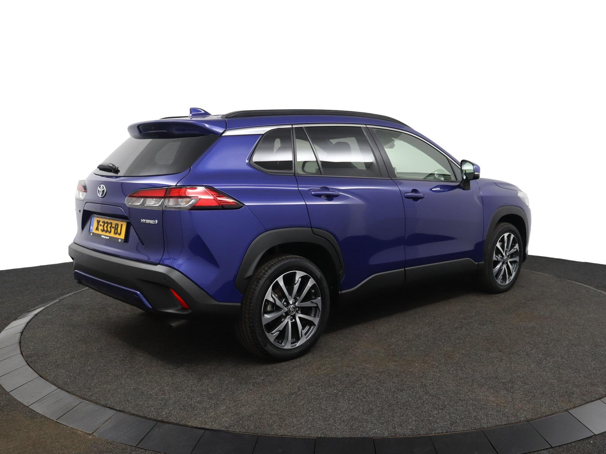 Toyota Corolla Cross Hybrid 200 Style | Stoelverwarming | Pa, Gebruikt, 4 cilinders, Blauw, Leder en Stof