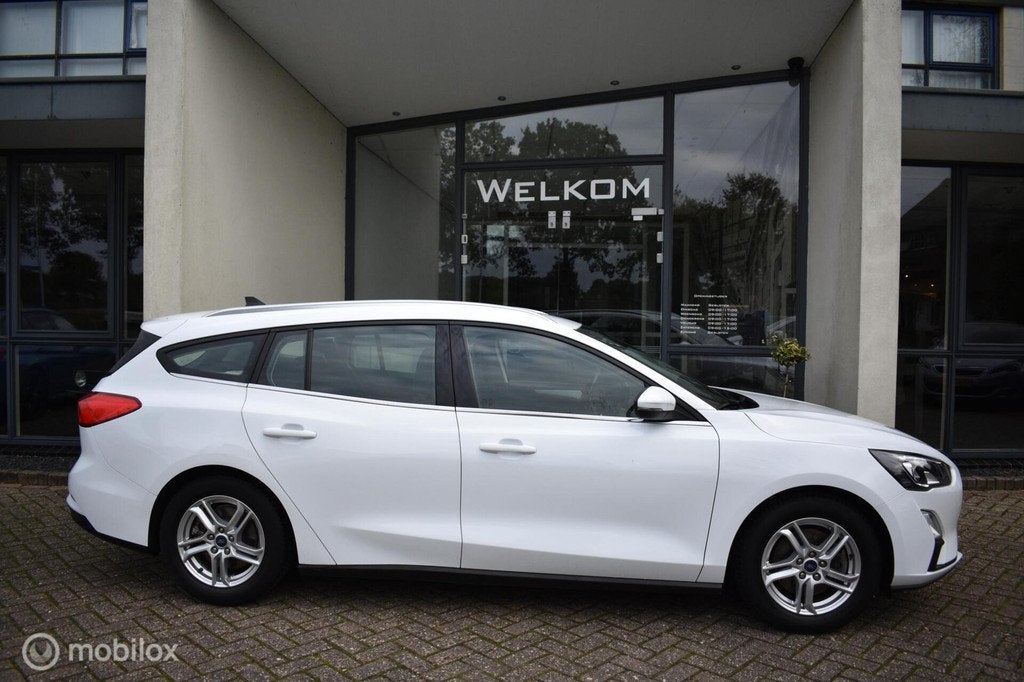 Ford Focus Wagon 1.0 EcoBoost Hybrid Trekhaak AGR Navi|LED, Stof, Wit, Origineel Nederlands, Lichtsensor