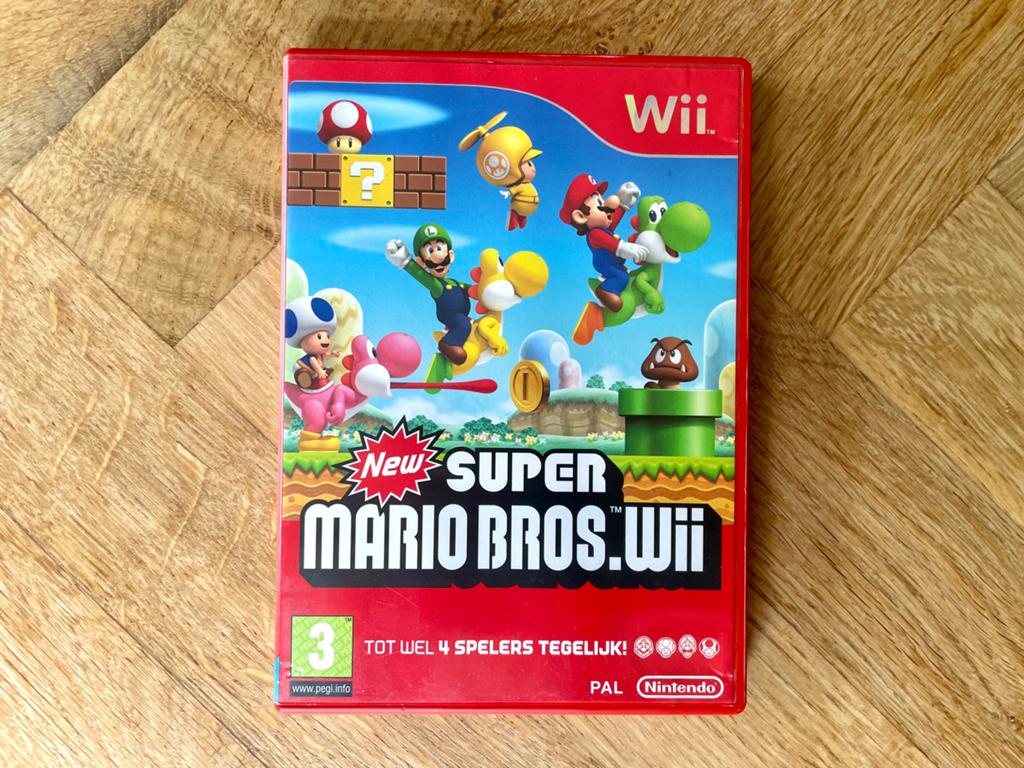 New Super Mario Bros. Wii - Nintendo (compleet, wat krasjes), Eén computer, Ophalen of Verzenden, Zo goed als nieuw, Platform