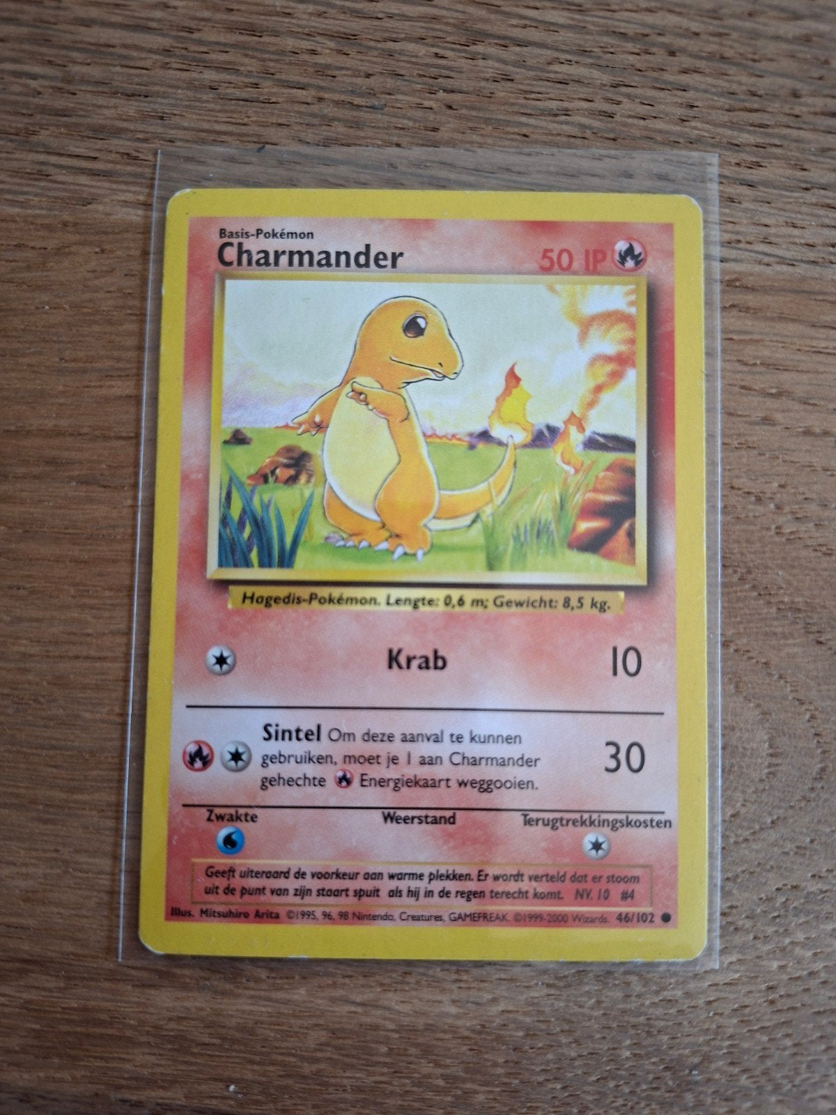 Pokemon Charmander 46/102 base set Nederlands, Hobby en Vrije tijd, Verzamelkaartspellen | Pokémon, Ophalen of Verzenden, Zo goed als nieuw