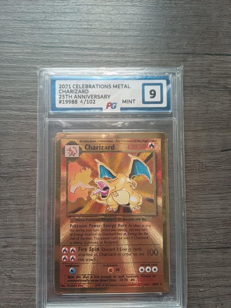 Charizard ultra premium collection gold metal promo #4 pg 9, Ophalen of Verzenden