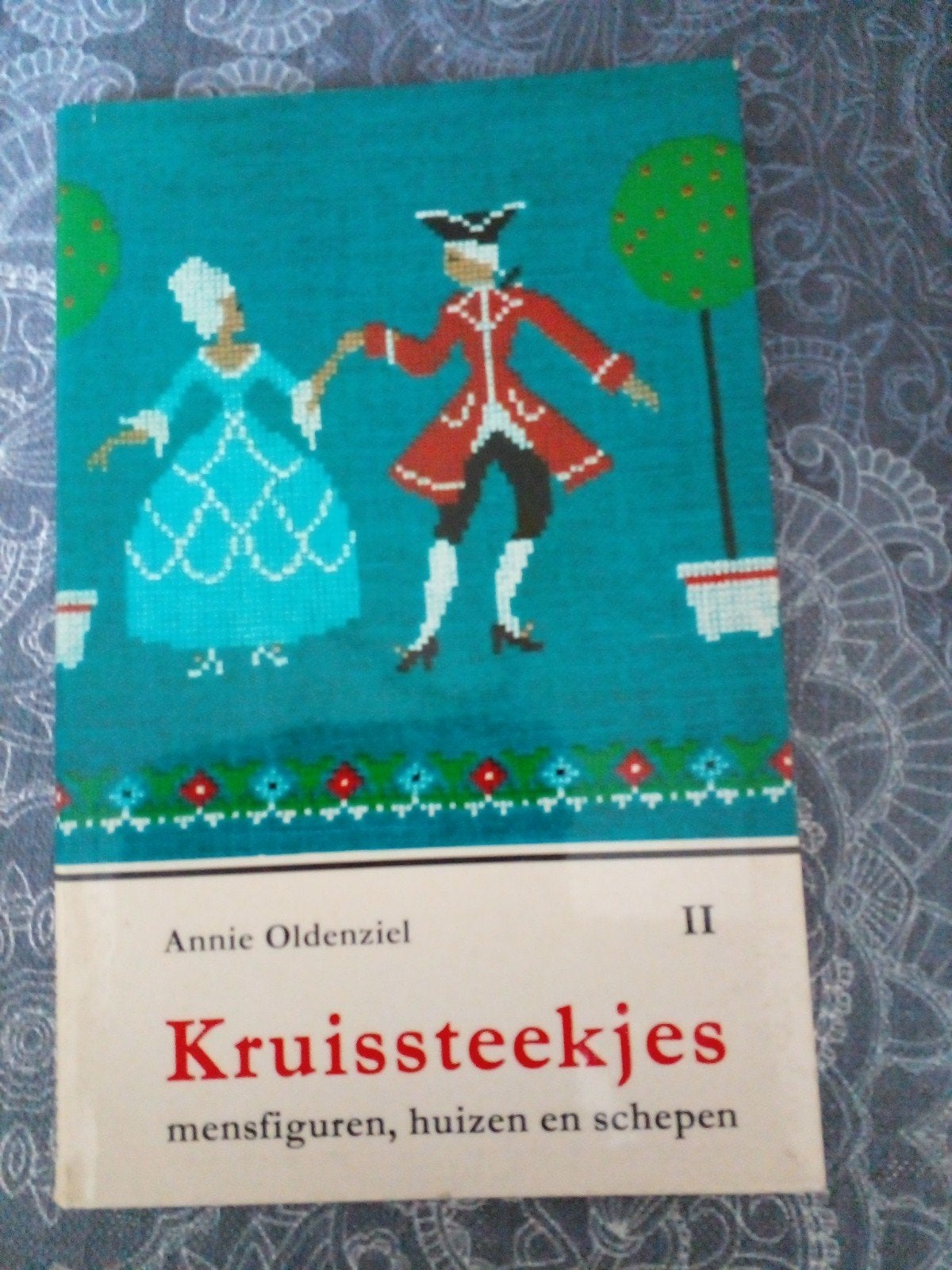 Kruissteekjes: mensfiguren, huizen en schepen, Verzenden, Zo goed als nieuw
