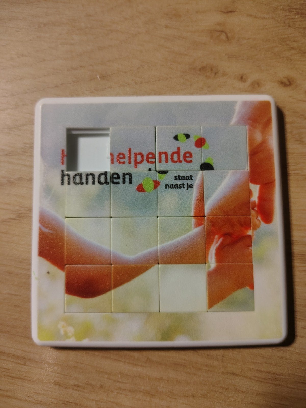 Helpende handen schuifpuzzel, Ophalen of Verzenden