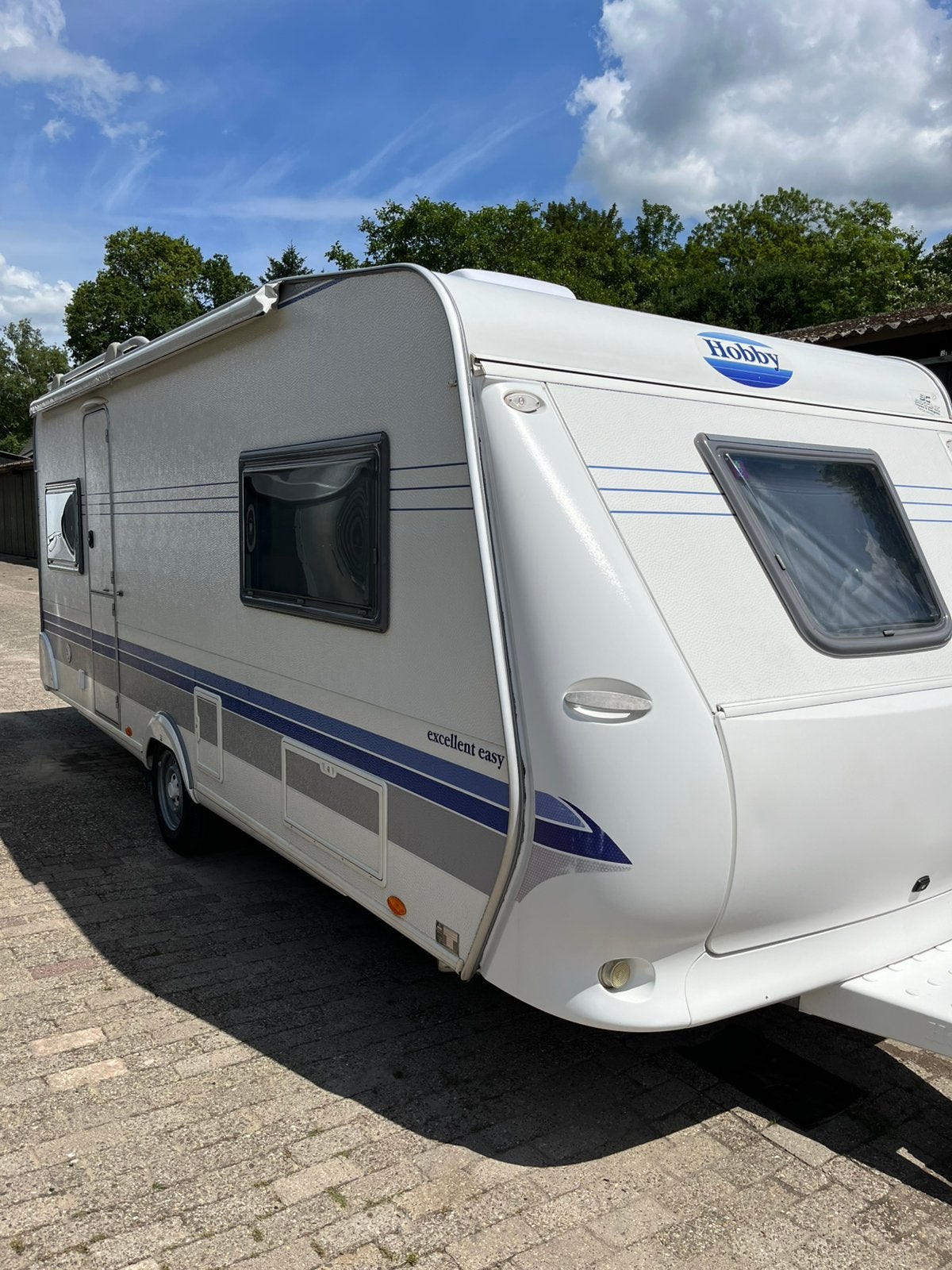 Caravan Hobby 540 UL  bouwjaar 2004 langslaper twee bedden., Caravans en Kamperen, Schokbreker, Standaardzit, Hobby, Particulier