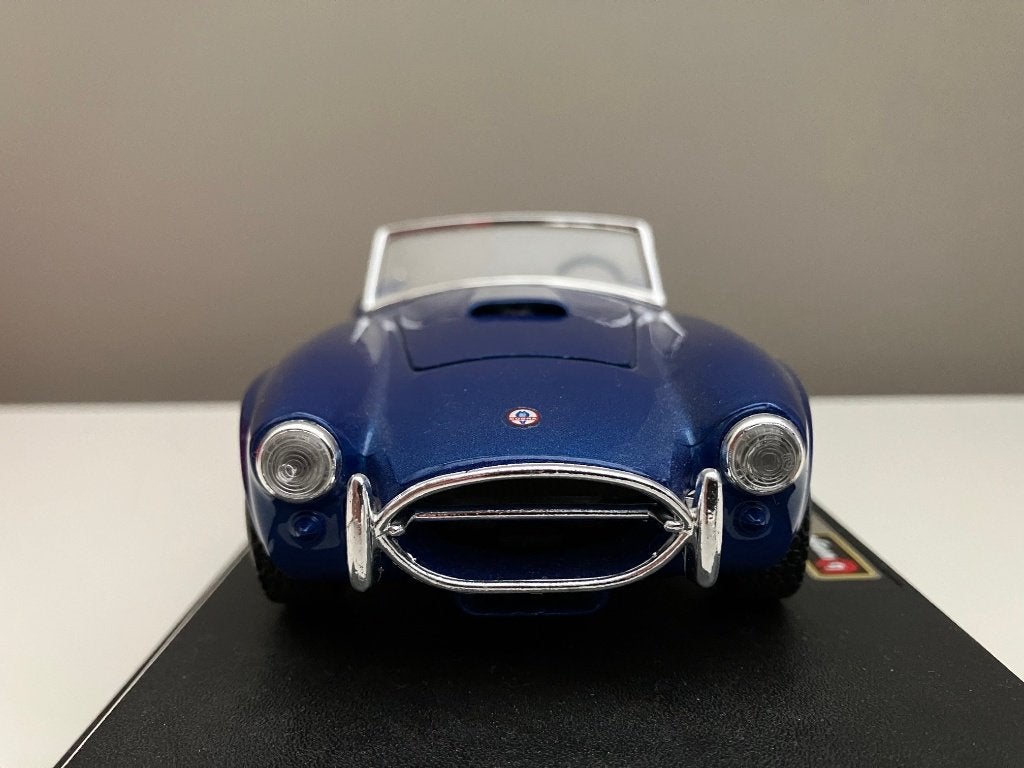 Bburago Ford AC Cobra 427 (1965) | 1:24 | originele doos, Ophalen of Verzenden, Gebruikt, Auto, Bburago