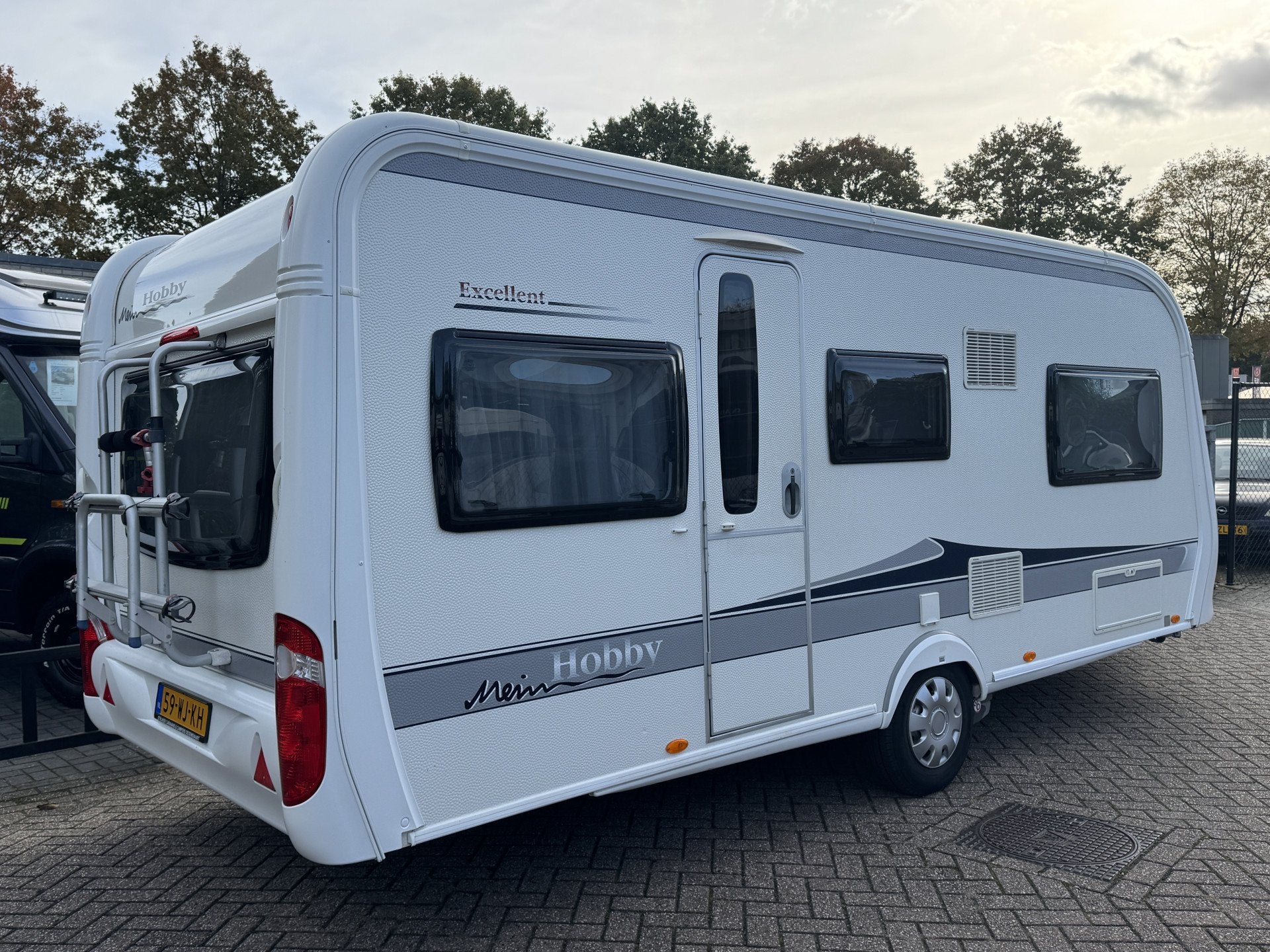 Hobby Excellent 495 UL met ENKELE BEDDEN en grote rondzit *M, Hobby, 7 tot 8 meter, Bedrijf, Reservewiel