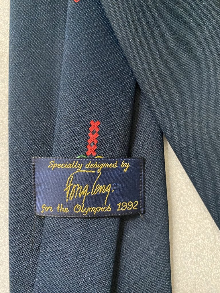 Fong Leng Olympische Spelen 1992 Amsterdam stropdas, Blauw, Ophalen of Verzenden, Zo goed als nieuw, Met patroon