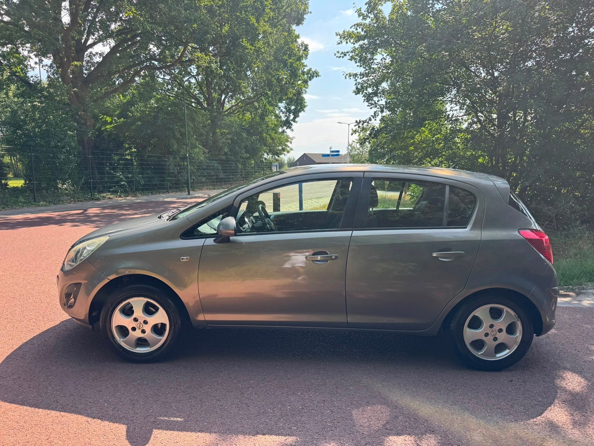 Opel Corsa 1.2-16V Anniversary Edition / Airco / NAP / Apk /, Auto's, Voorwielaandrijving, Euro 5, Gebruikt, 4 cilinders