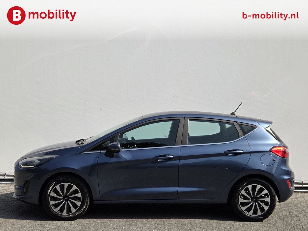 Ford Fiesta 1.0 EcoBoost Hybrid Titanium Stoel/Stuurwielverw, Auto's, Ford, Voorwielaandrijving, Gebruikt, 1133 kg, Blauw