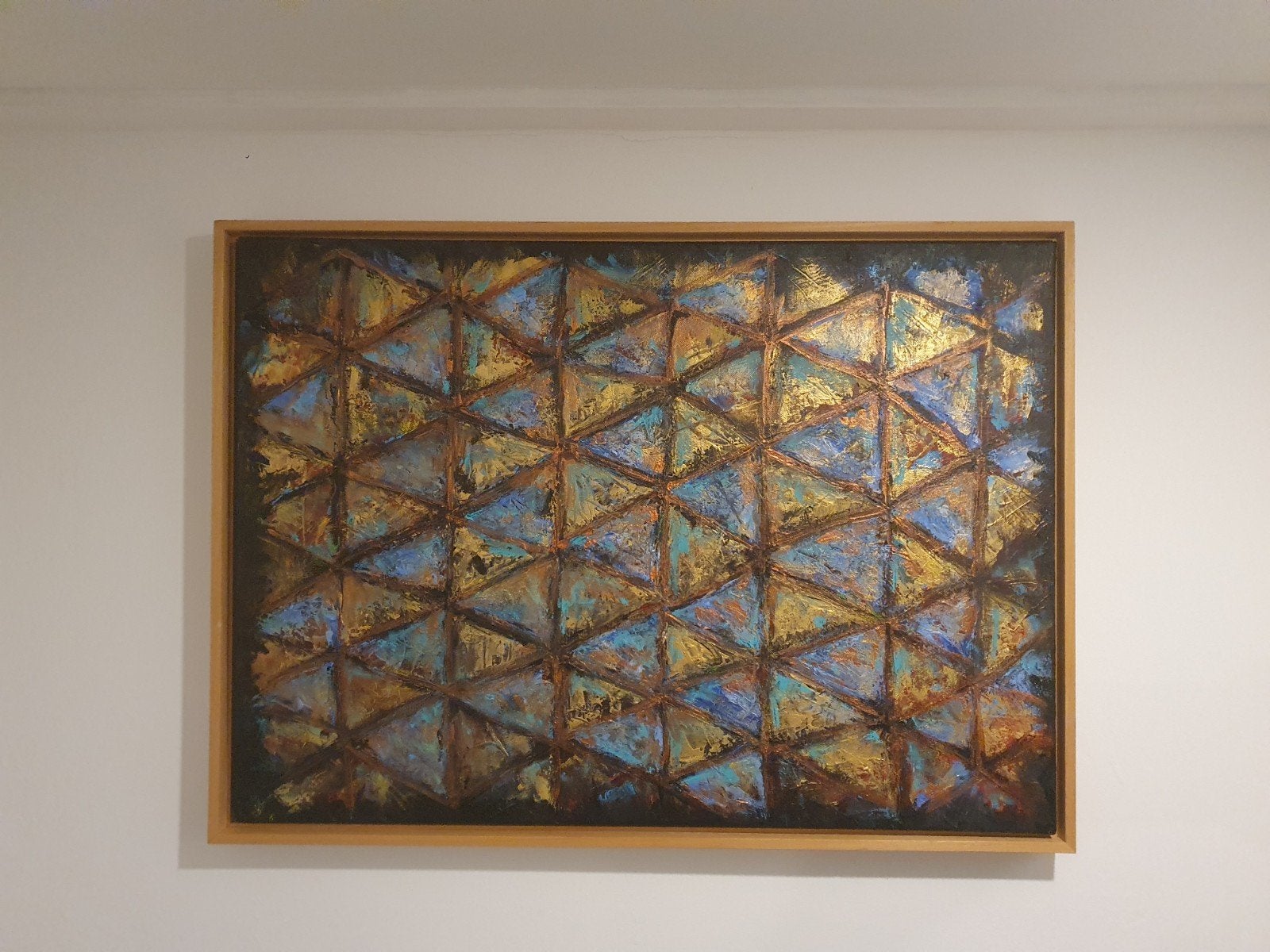 Abstract schilderij met geometrische patronen, Ophalen