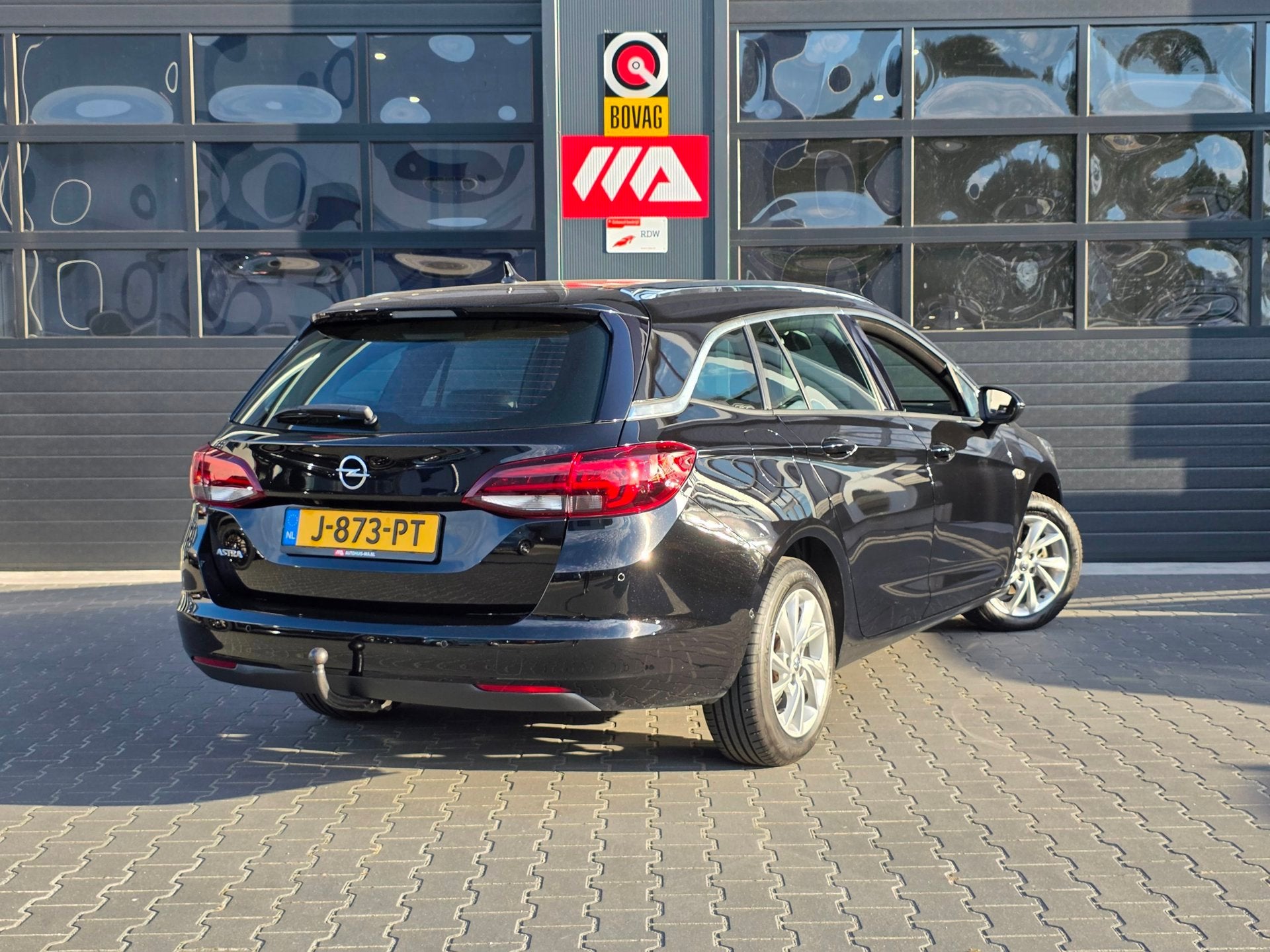 Opel Astra Sports Tourer 1.2 Elegance | TREKHAAK | NAVI | CA, Auto's, Voorwielaandrijving, Dealer onderhouden, Stof, Gebruikt