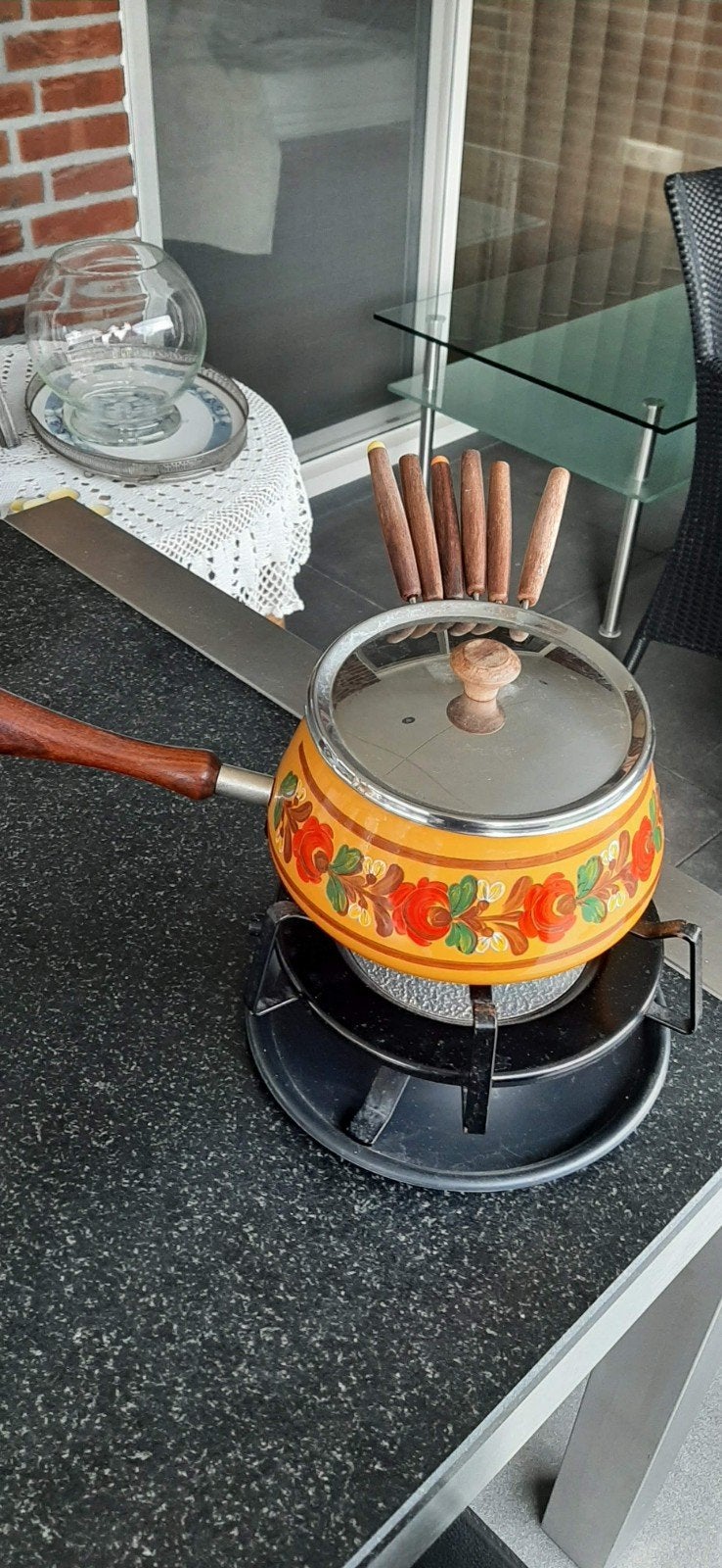 Vintage fonduestel, Ophalen