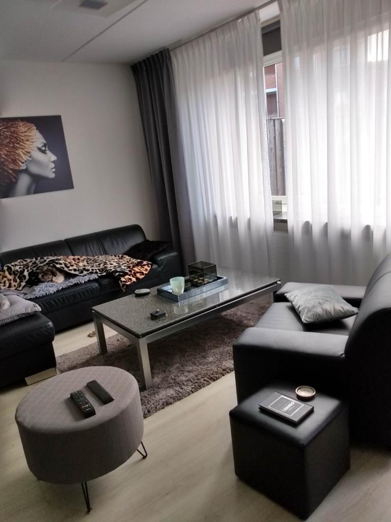 Zwart echt leren bank met chaislounge., Ophalen of Verzenden, Gebruikt