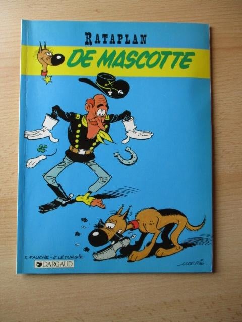 Lucky Luke Rataplan strip  deel 1  De mascotte, Boeken, Eén stripboek, Ophalen of Verzenden, Gelezen