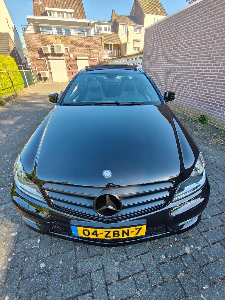 Mercedes C180 Coupé AMG Line  2012 original (NL), 745 kg, Achterwielaandrijving, 1800 kg, Zwart