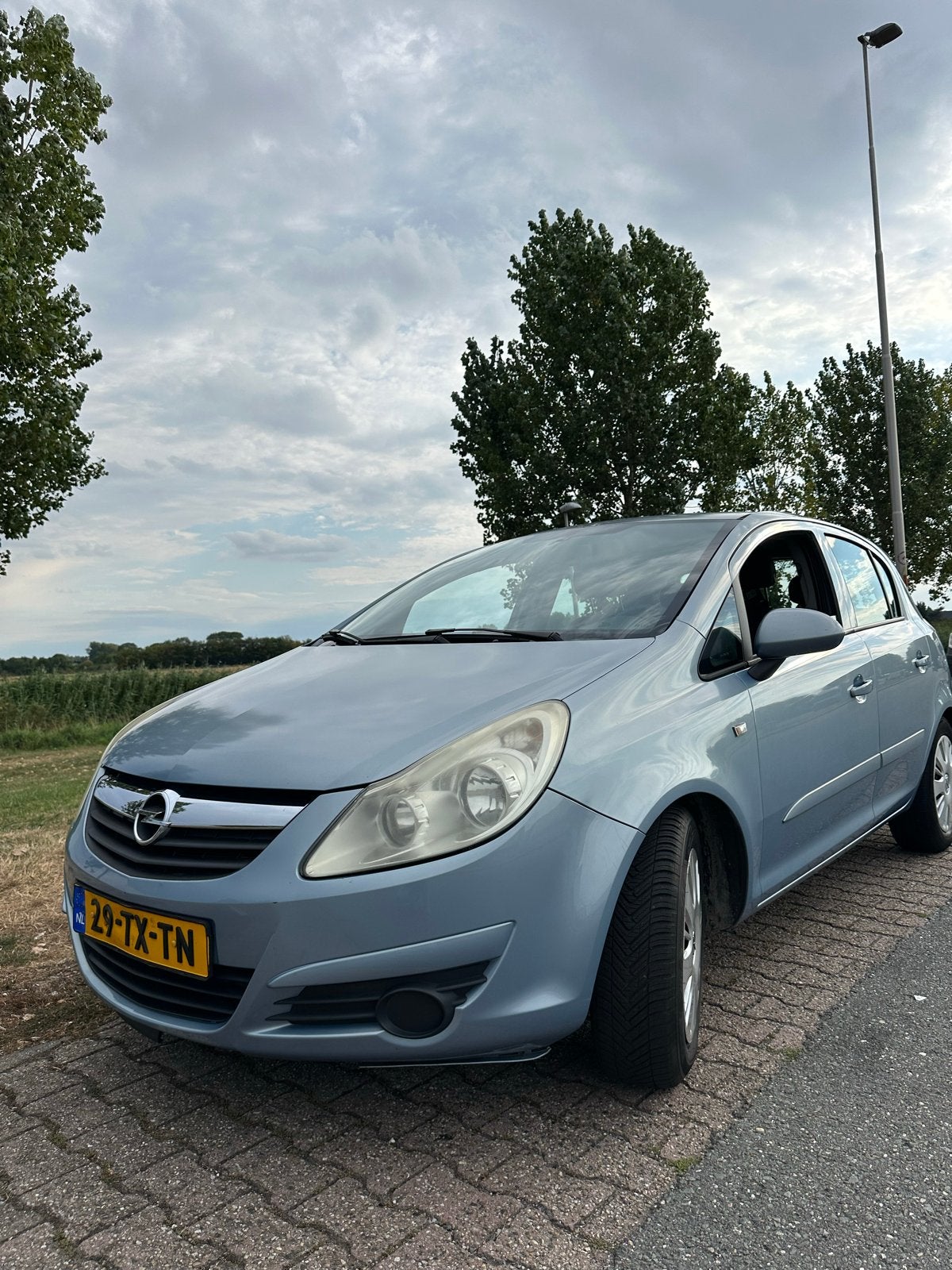 Opel Corsa 1.2 16V 5D WR 2007 Blauw, Voorwielaandrijving, Stof, Zwart, 4 cilinders