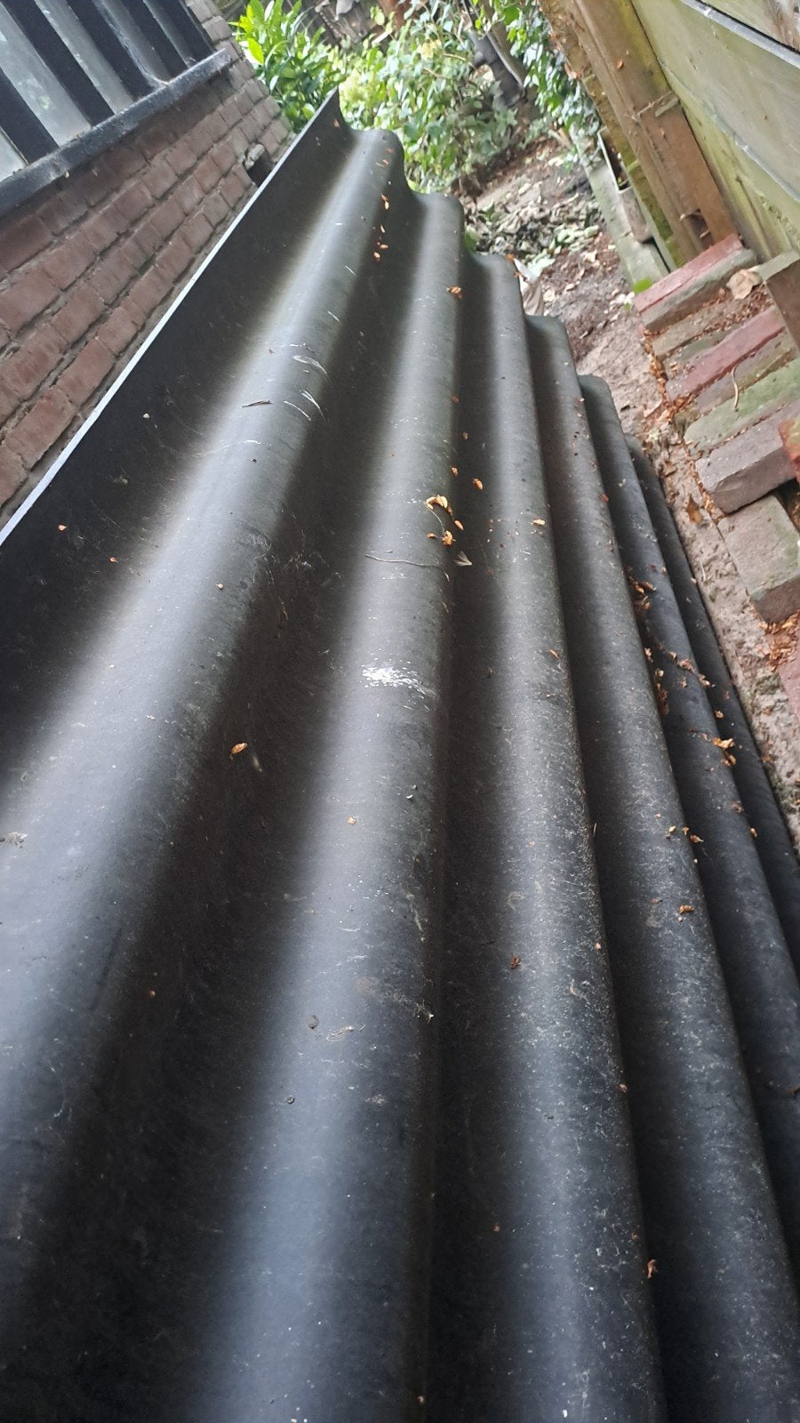 11 zwarte golfplaten, 2.40 x 1.20m, Ophalen