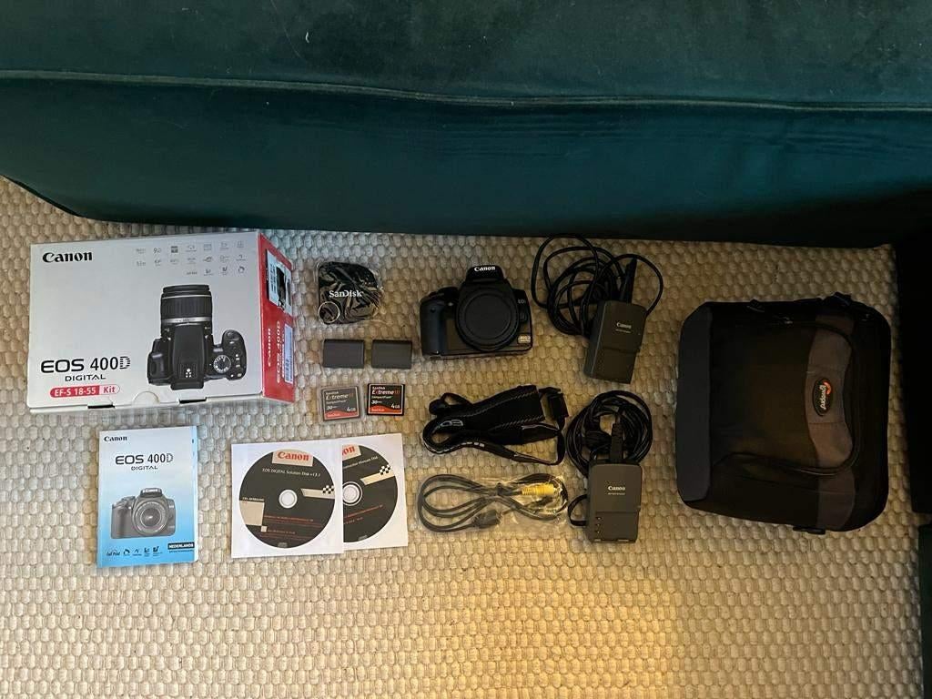 Canon EOS 400D body + accessoires, Gebruikt, Spiegelreflex, Canon, Ophalen of Verzenden